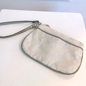 Coach Signature Logo Wristlet. Beige and Silver Interior Satin.